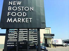 New Boston Food Market: Employs 700 people, many of them local, and could be undermined by a planned trash transfer plant, according to owners.